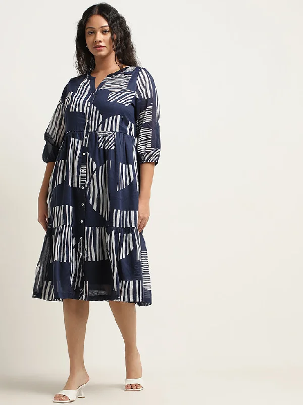 Age-reducing Style Gia Navy Abstract Design Tiered Cotton Dress